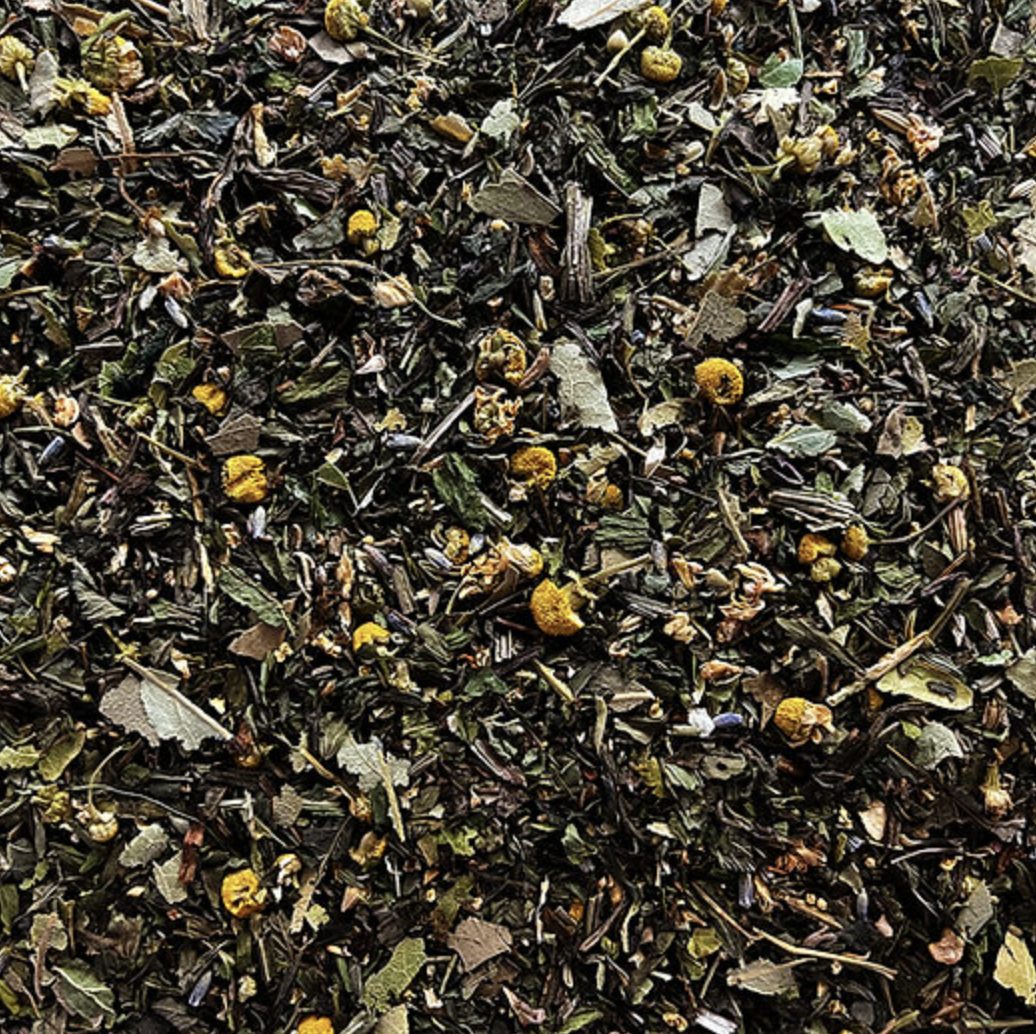 Mellow Fellow Tea Herbal Blend Close-Up – MB Superfoods Close-up of Mellow Fellow Tea herbal blend with chamomile, mint, lavender, and reishi.